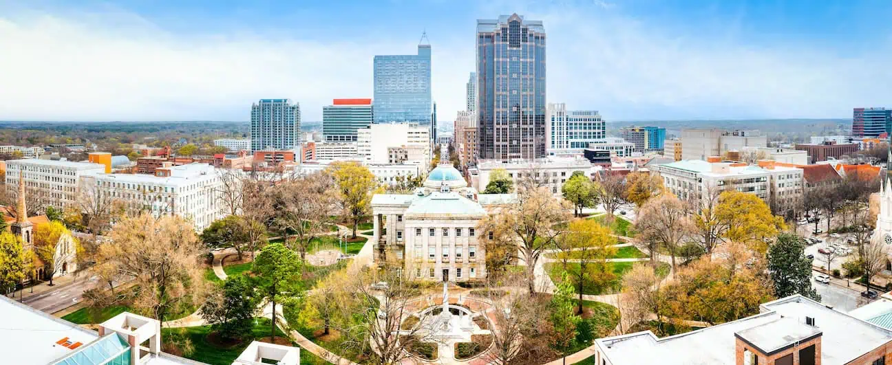 A view of Raleigh, NC's capitol building and some of the downtown skyline