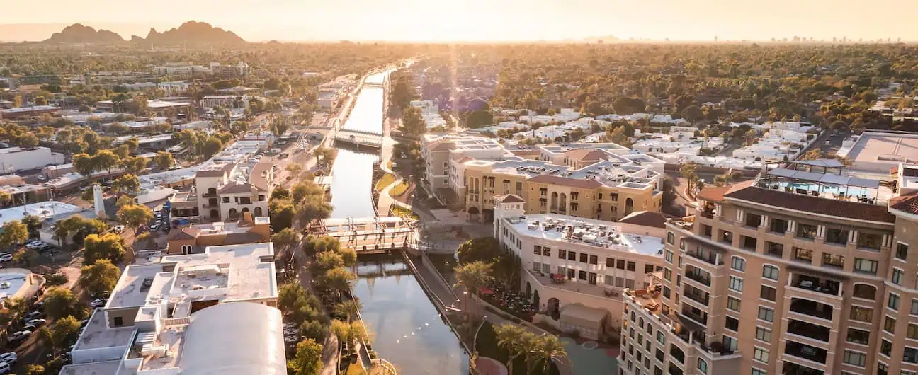 A view of downtown Scottsdale, AZ and the canal at sunset 