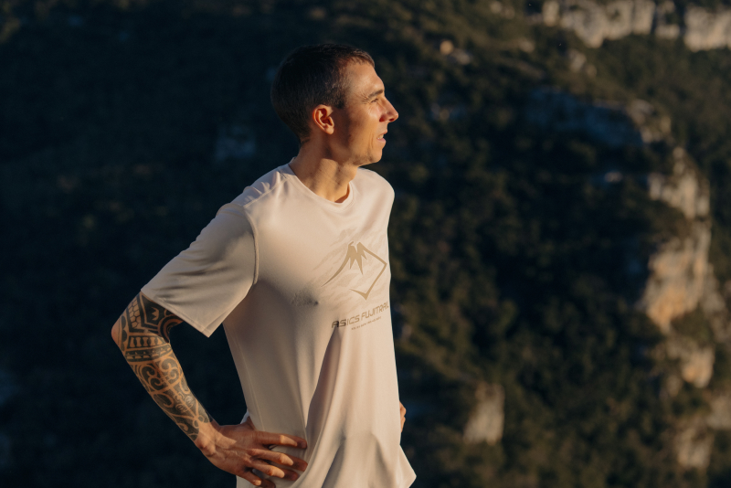 ASICS Athlete Wearing Training Gear.