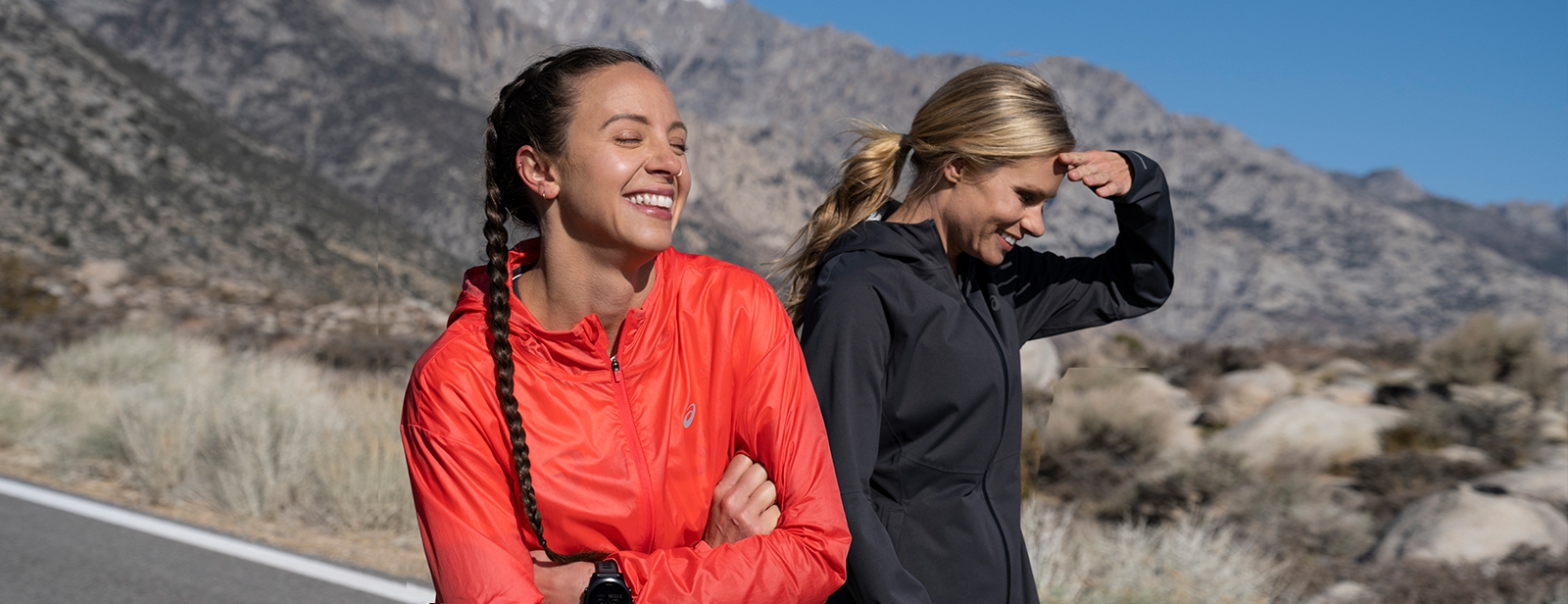 Two girls sitting outside