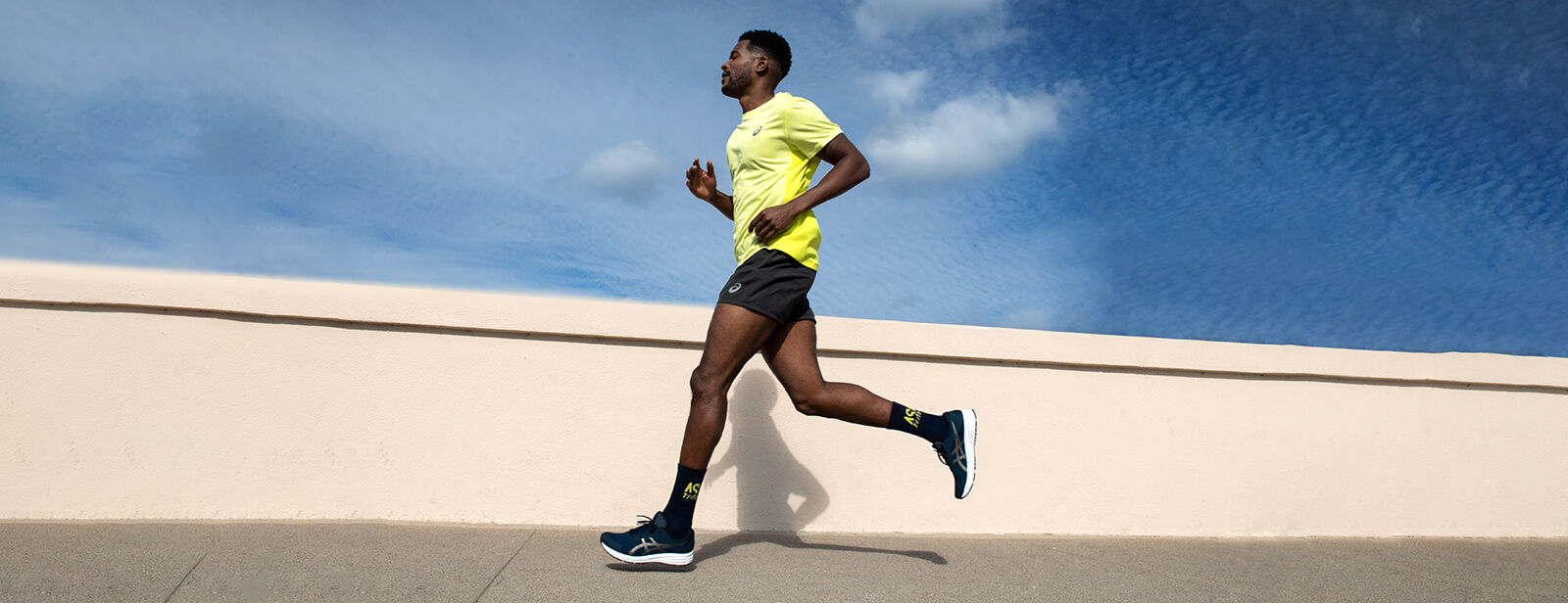 Man running outside in the sun