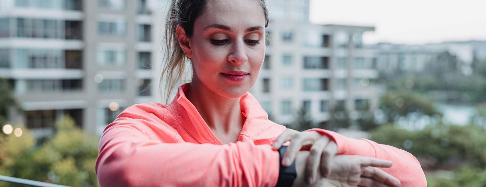Women looking at her training watch