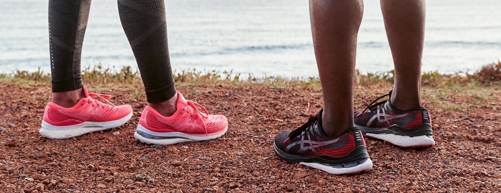 close up on two runners feet wearing ASICS shoes
