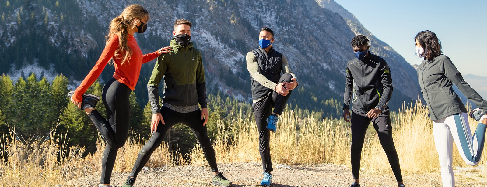 5 runners outside stretching