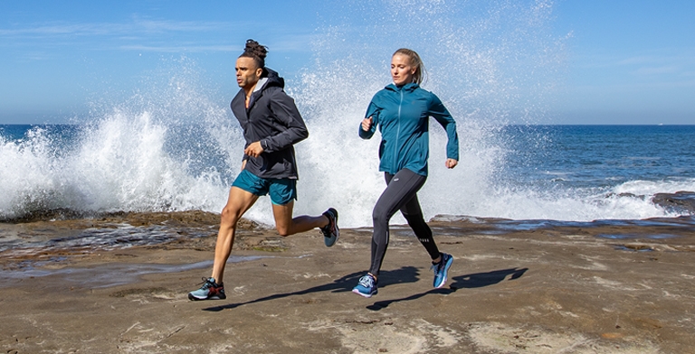 Man and Woman running outdoors