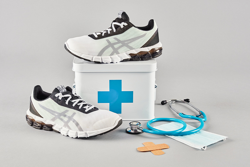 First aid kit and Asics shoes