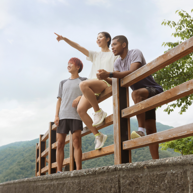 ASICS Models Standing Outside.