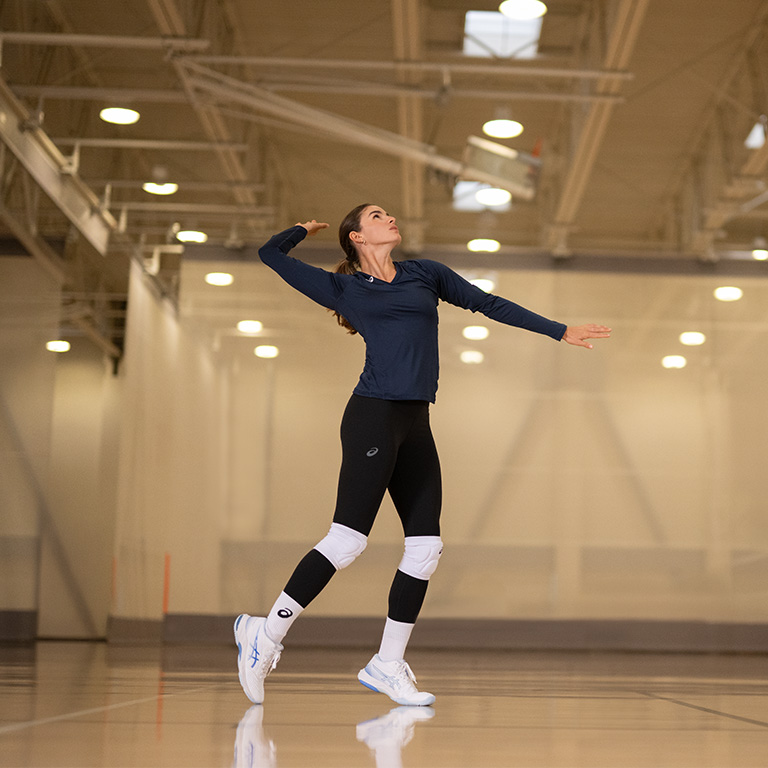 ASICS Athlete practicing Volleyball.