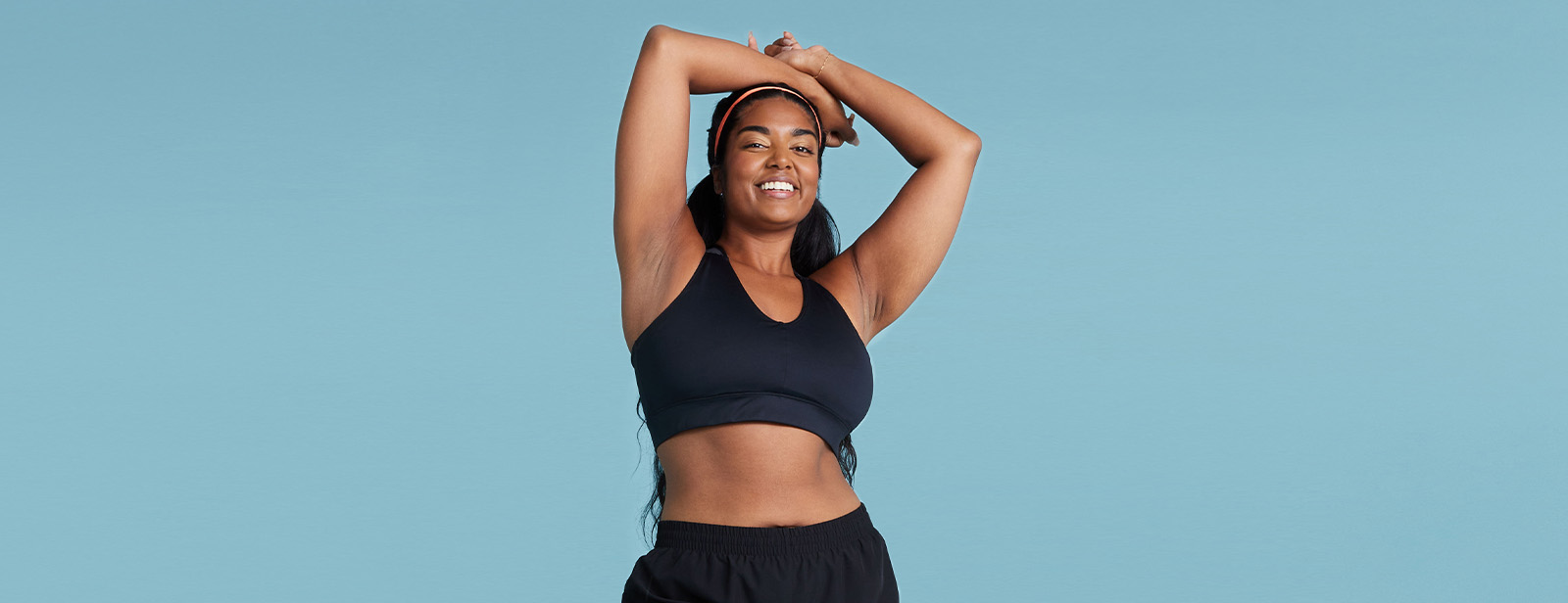 Women in an ASICS sports bra