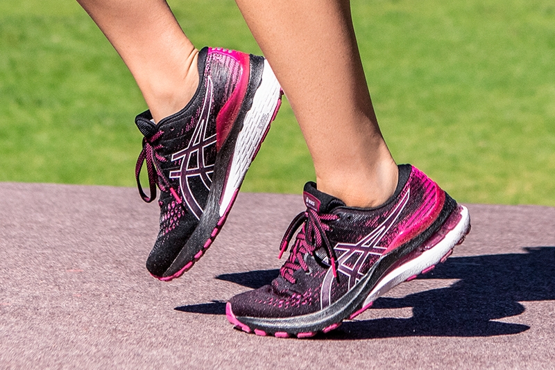 Women wearing Asics shoes