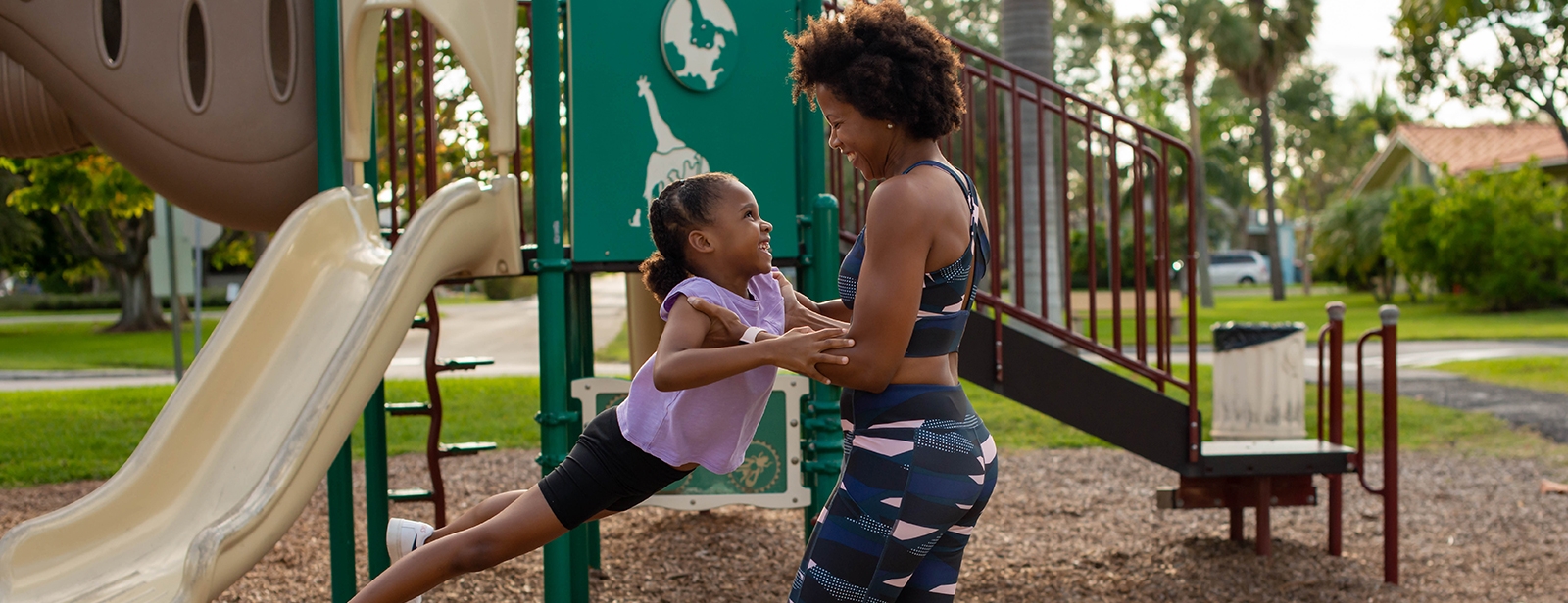 Women and child at a playground