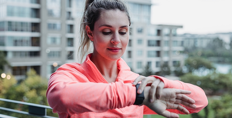 women looking at watch
