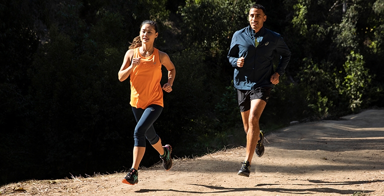 man and woman running
