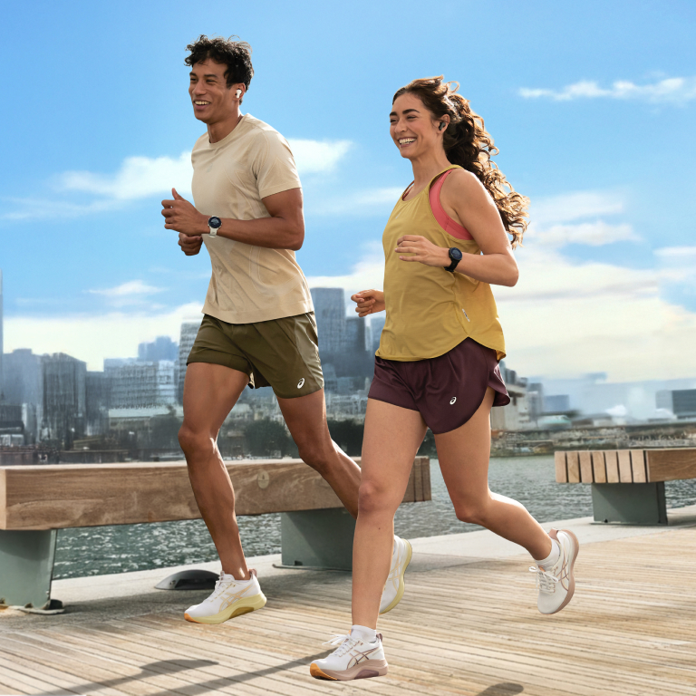 Women running on a dirt field