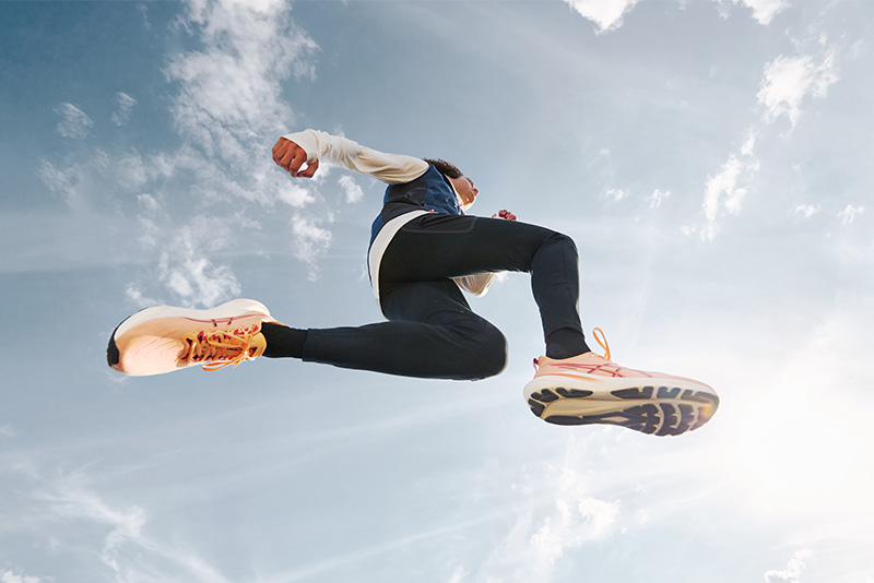 ASICS Athlete running. 