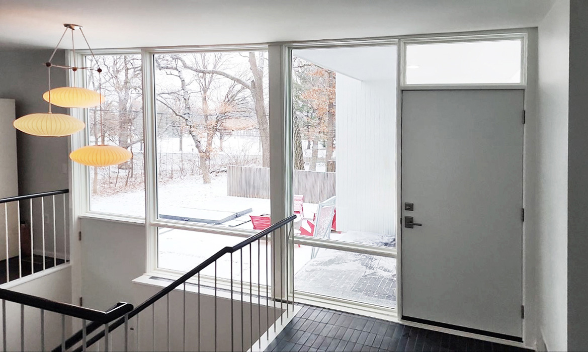 Interior of mid-century modern home in Falcon Heights showcasing newly installed windows.