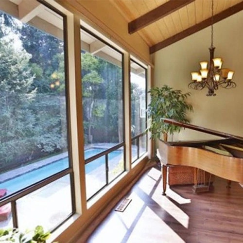 Before - Old Picture Windows In Grand Piano Room Outdated floor to ceiling windows in San Jose home.