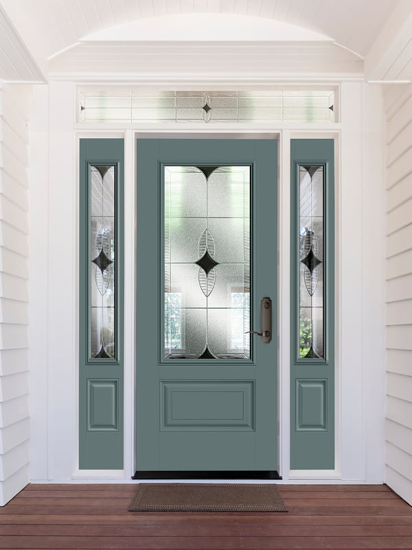 front entry door with decorative glass and dual sidelights in a white home