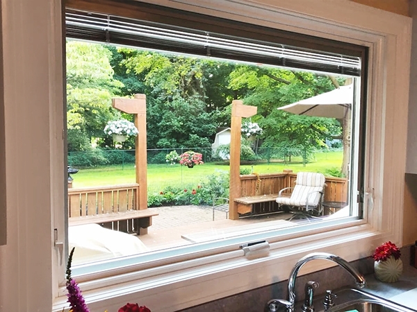 Newly installed Pella kitchen window with built in blinds in Mentor home.