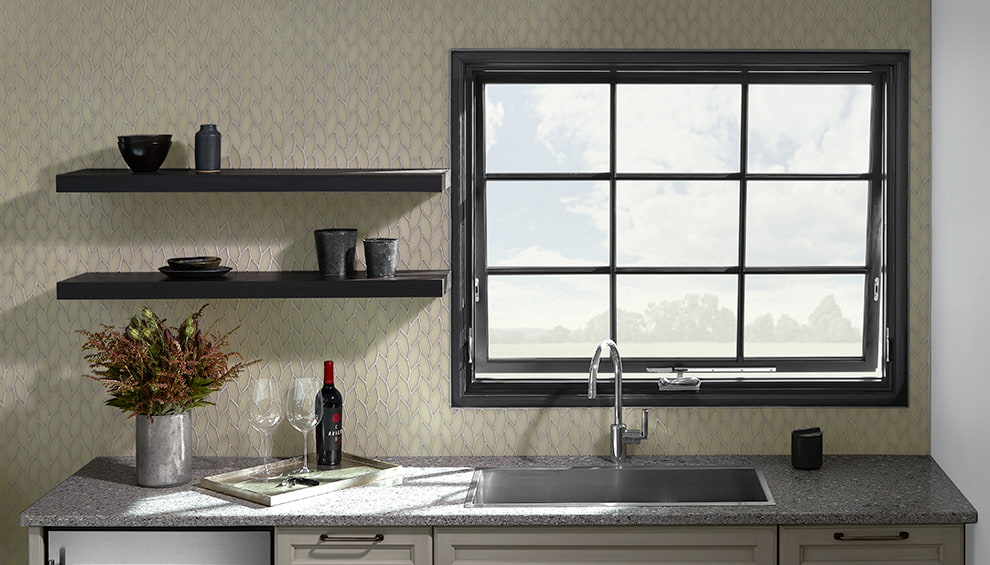 A single large awning window to the right of simple shelves above a counter.
