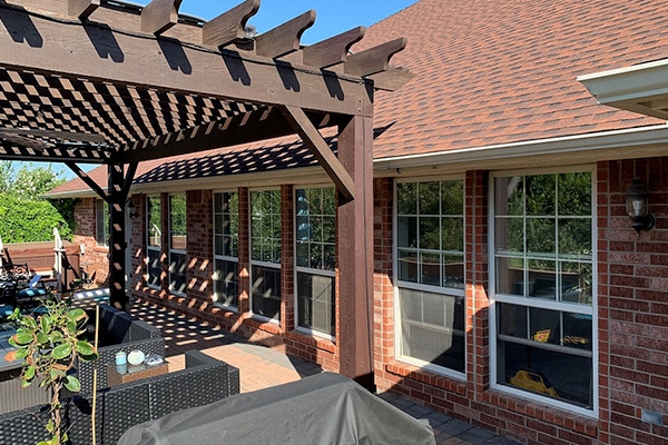 a row of double-hung windows on a brick wall of an Oklahoma City home