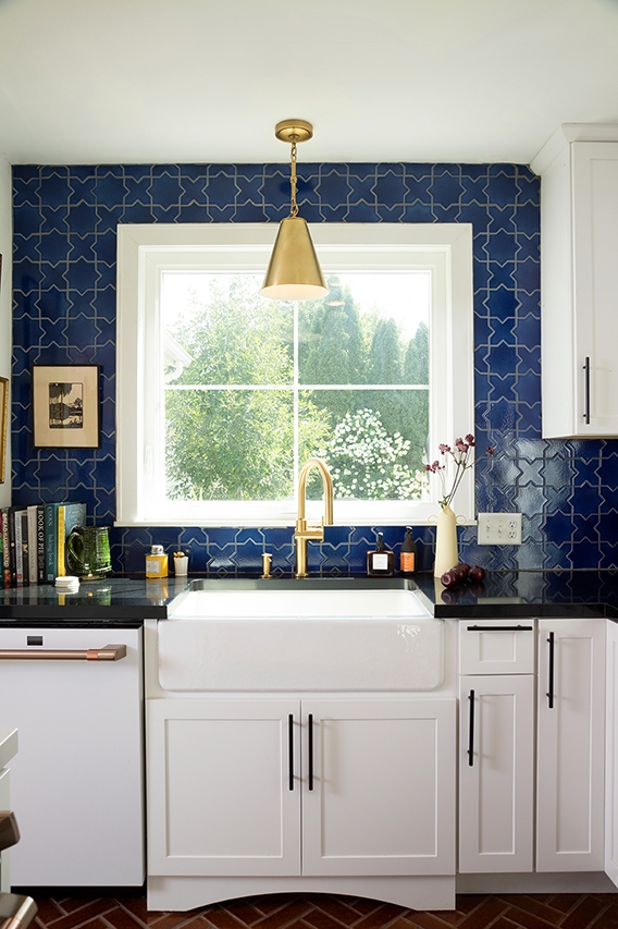 Minnesota cottage home with newly installed Pella awning window above sink.