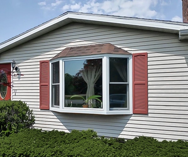 After image of newly installed bay window on Greenfield home looks sharp.