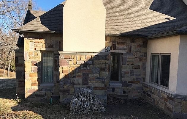 the exterior fireplace on a Tulsa home