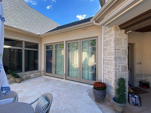An Oklahoma home with two new sets of french doors opening to the patio