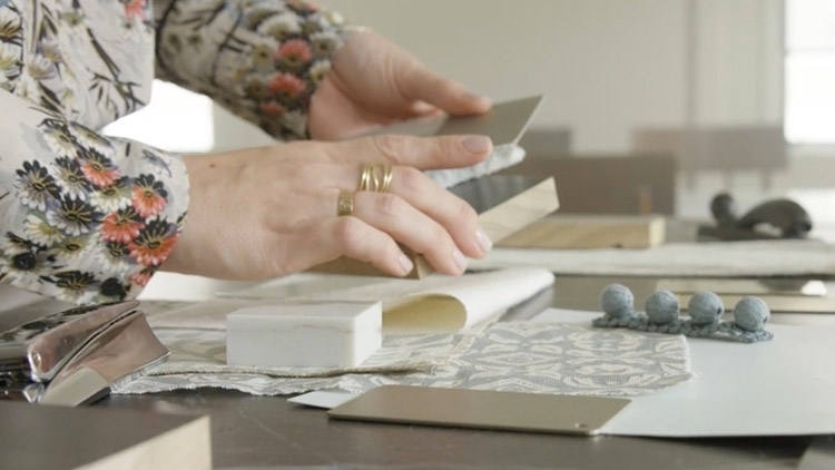 wood interior finish woman working on swatches