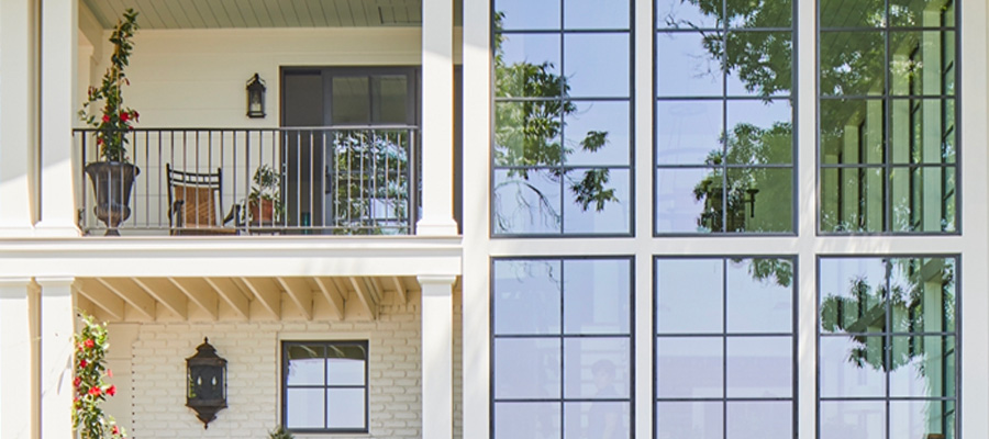 six reserve contemporary fixed windows on the right and a two-story deck on the left