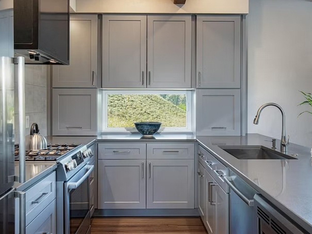 kitchen cabinet window in the center of a wall of cabinets