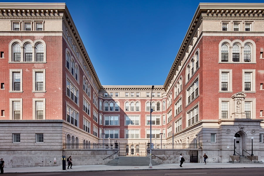 Brick building with white double-hung windows