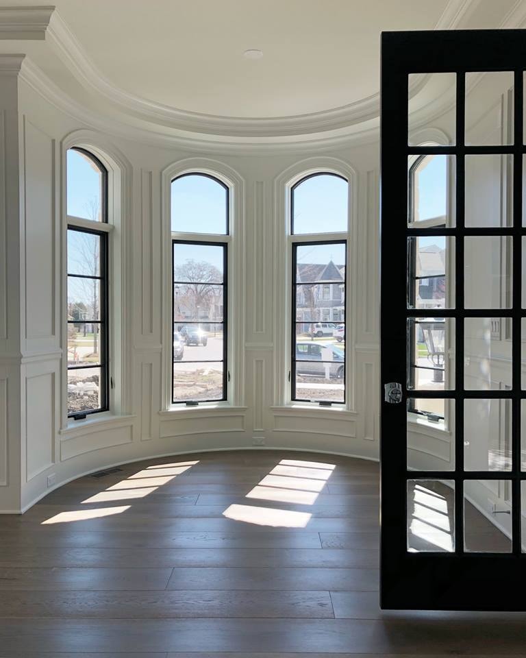 Arch top casement windows fit in round shaped room