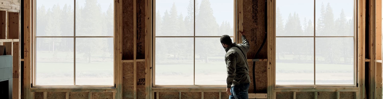 the pella sticker on a new window in a home under construction