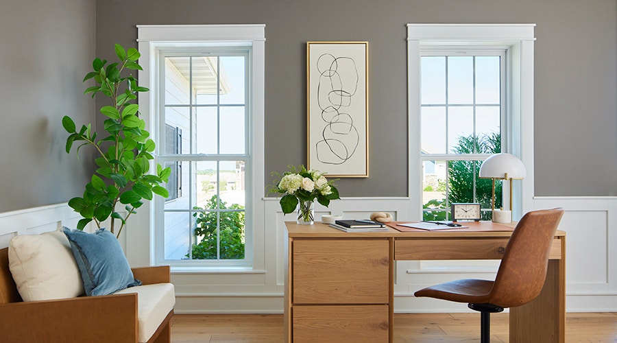 White tall windows in office.