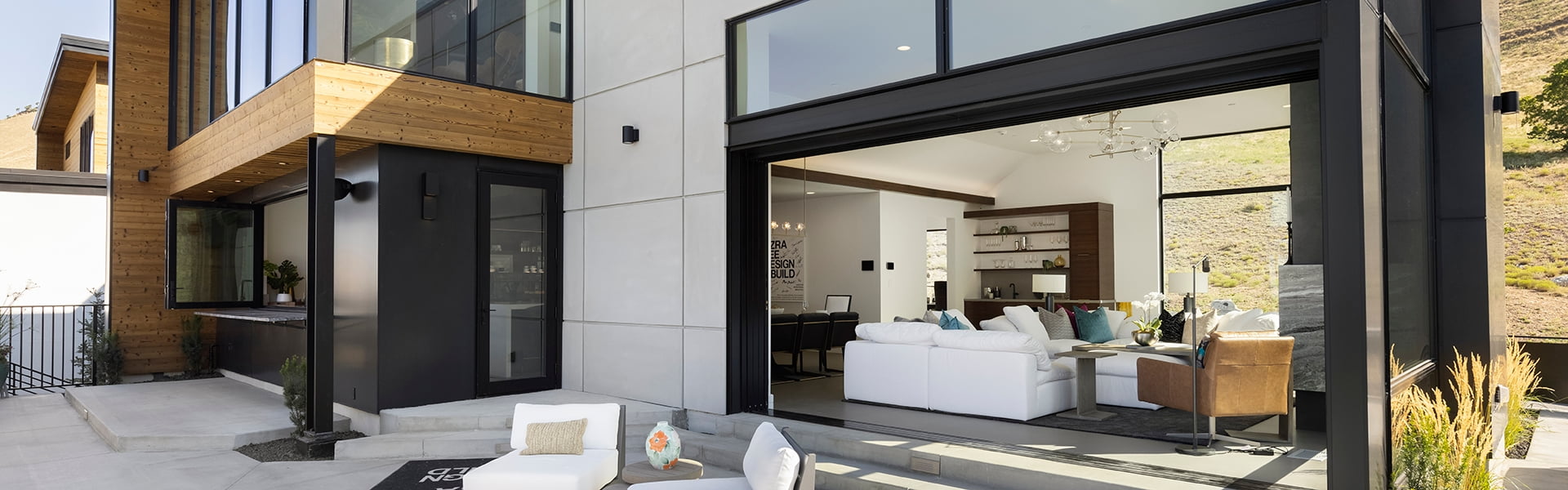 wide shot of black-trimmed pella windows and doors