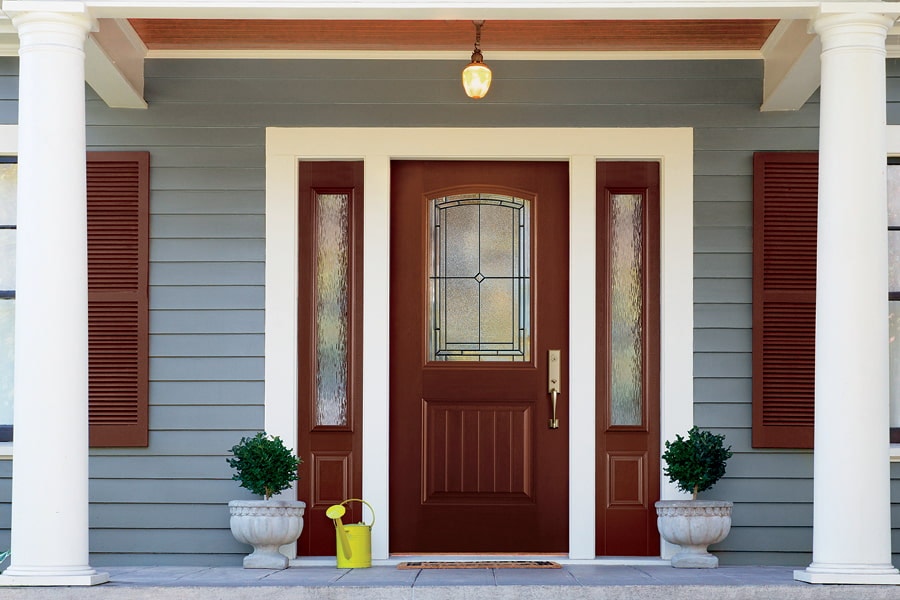 Half-light windows with decorative glass wood entry doors with sidelights