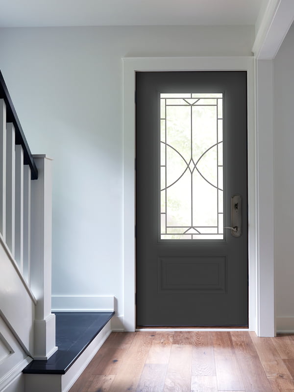 interior of black front door with decorative glass