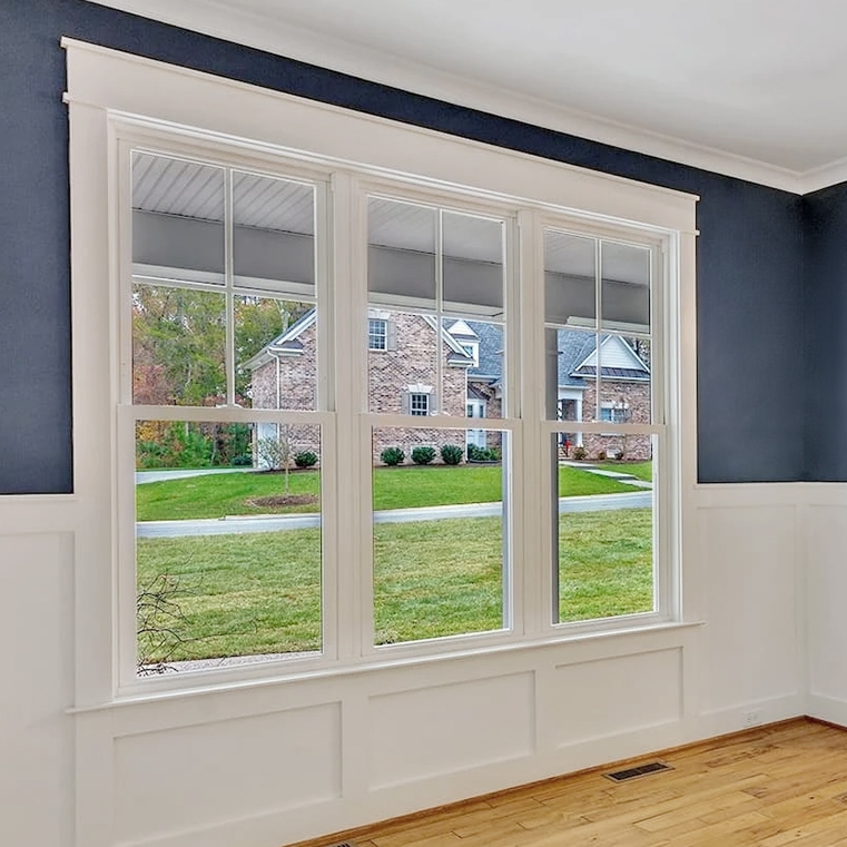 Energy efficient white double-hung windows inside Richmond home.