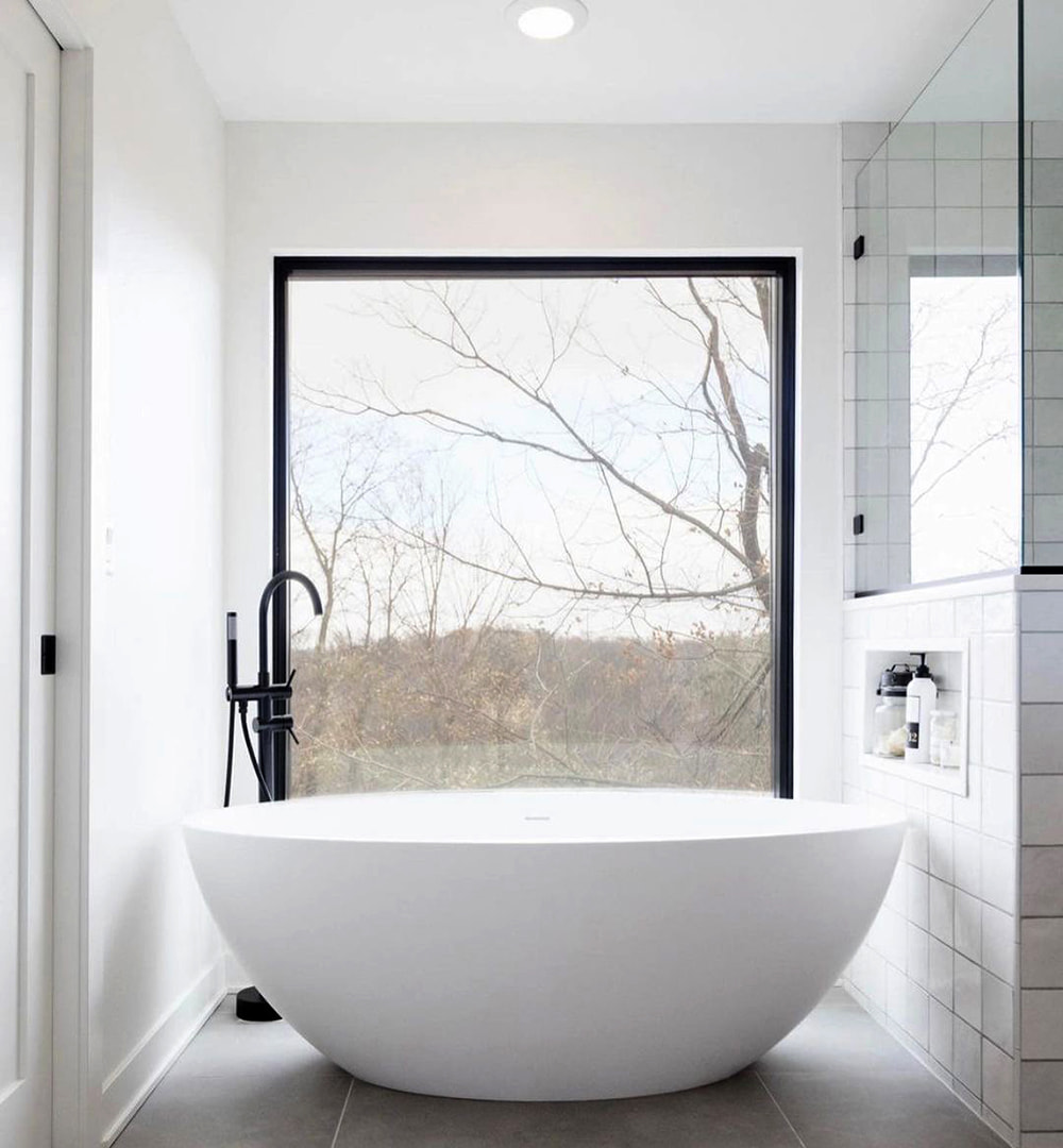 Massive Bathroom Window Makes Small Space Feel Large and Well Lit Pella