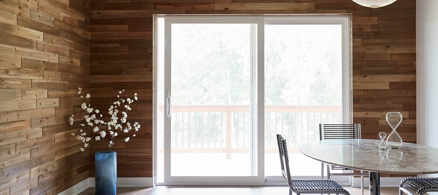 two panel pella 250 series sliding door with wood lap walls