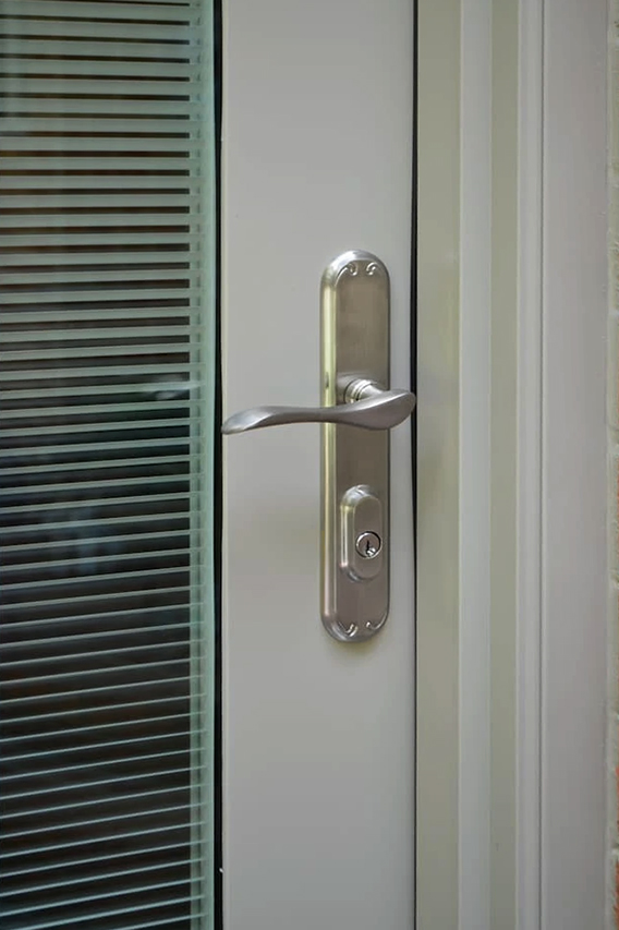 Upgraded hardware on newly installed Patio French Door. 