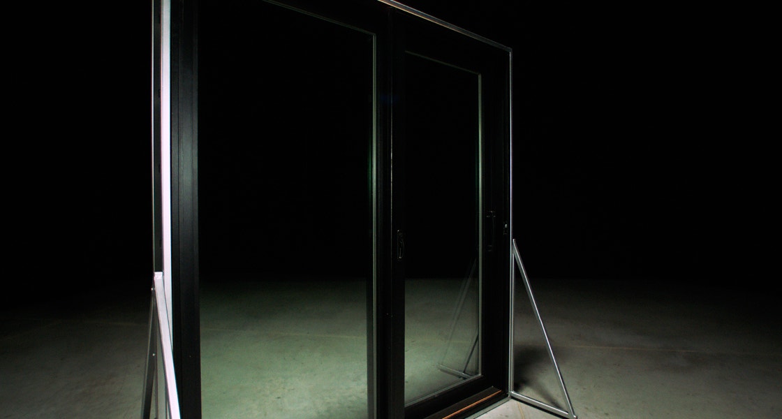 a dramatic shot of the sliding patio door with rolscreen retractable screen