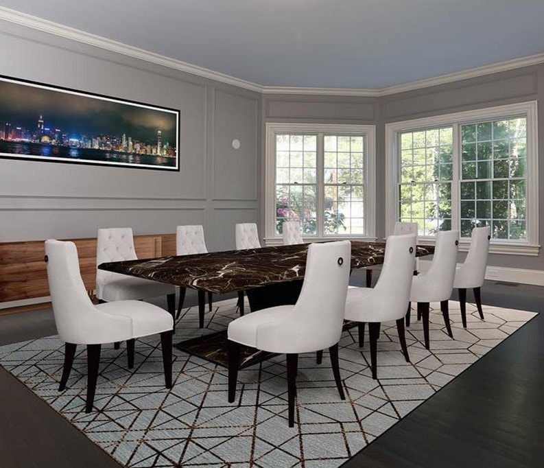 Formal dining room with long elegant table and a row of white double-hung windows with traditional grilles