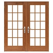 lifestyle hinged patio door with traditional grilles