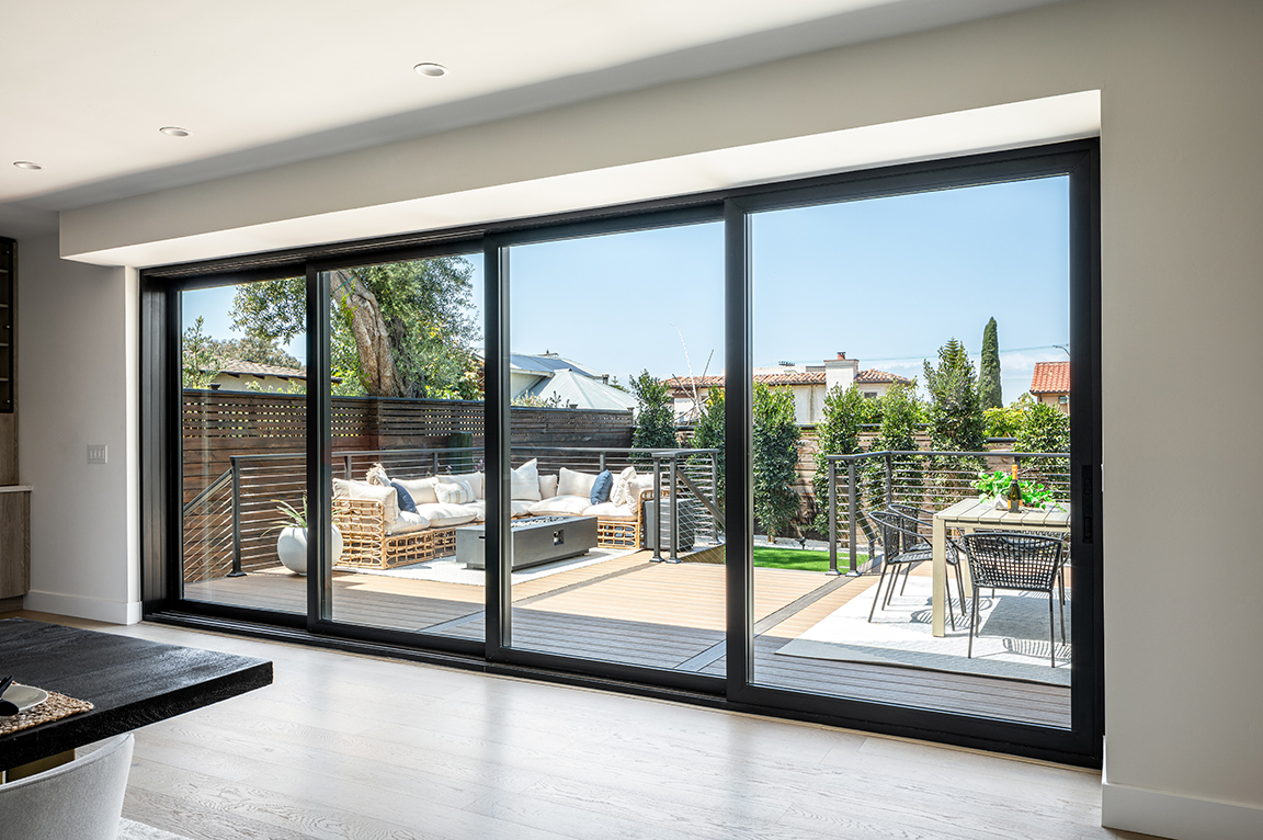 Interior view of closed multi-slide patio door on La Jolla home.