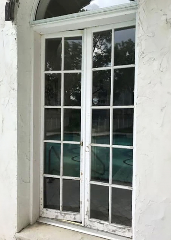 Outdated french doors on Cleveland home.