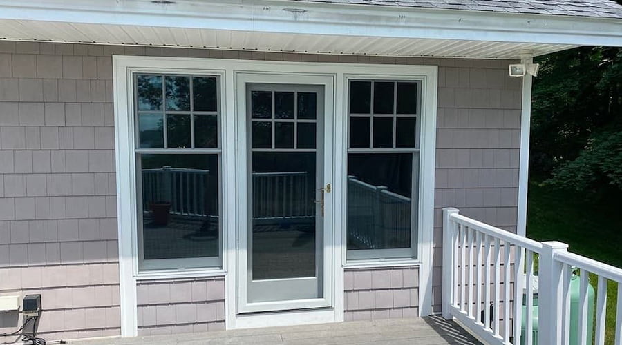 the exterior of an Andover home with new double-hung windows.