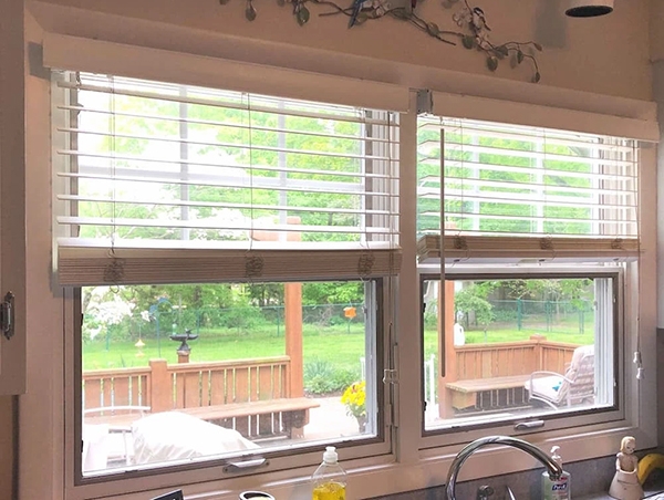 Outdated kitchen window in Mentor home in need of replacement.